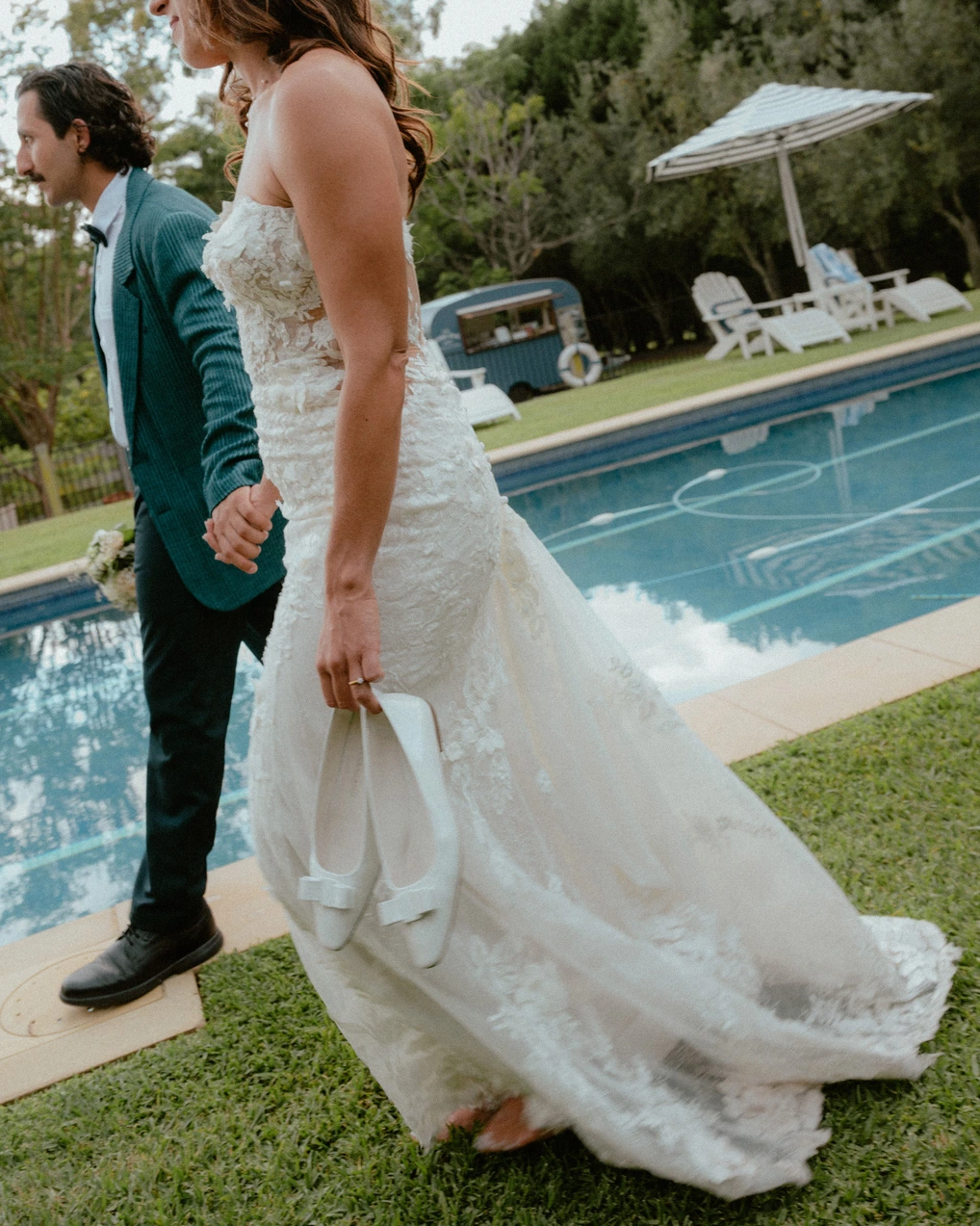Wedding couple by pool